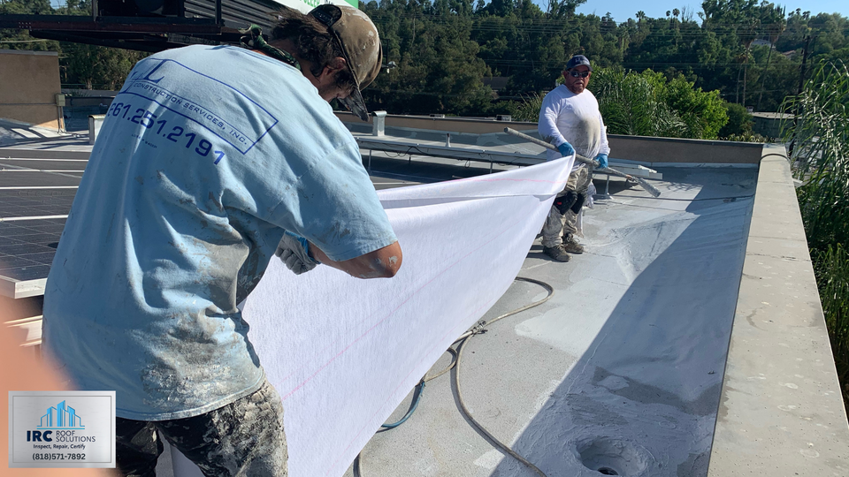 Single-ply membrane installation detail on a commercial low-slope roof.